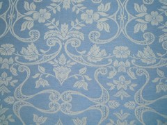 Tovagliolo, tessitura artigianale in misto lino/cotone, disegno con floreale di colore azzurro, finitura a punto giorno, cm 40x40open stitch, grey color available in size cm 40x40.